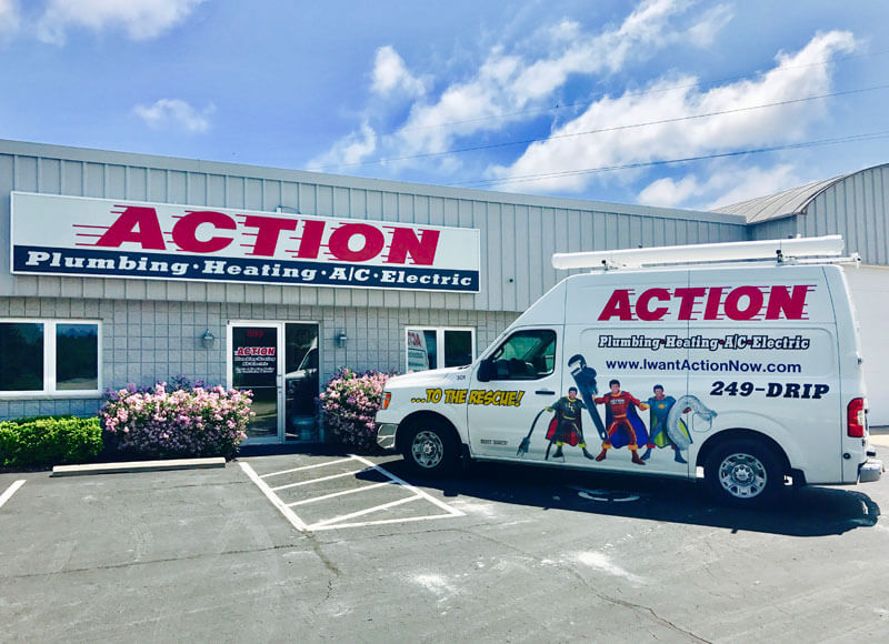 The Action Plumbing, Heating, Air Conditioning and Electric storefront with a company van