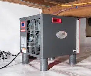 Closeup of HVAC technician working on an AC condenser unit